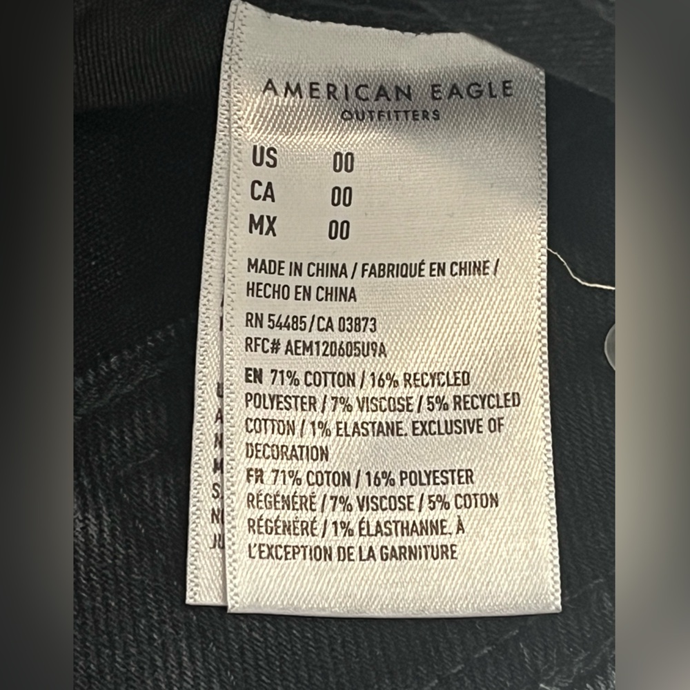 American Eagle black factory distressed jean skirt. Size 00 - Picture 9 of 10